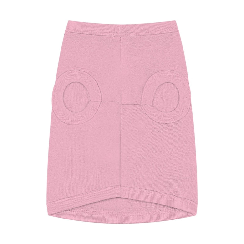 Pink shirt with circular cutouts on a white background