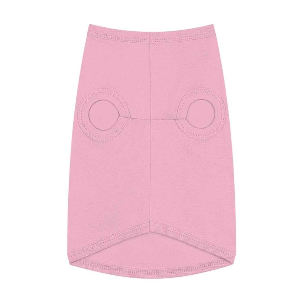 Pink dog dog with circular cutouts on a white background