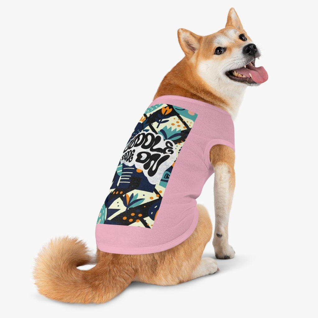 Dog wearing a pink colorful outfit with a pink base on a white background