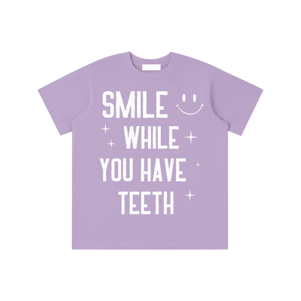 Essential Kids' T-shirt - Gooso Pixel smile while you have teeth purple 