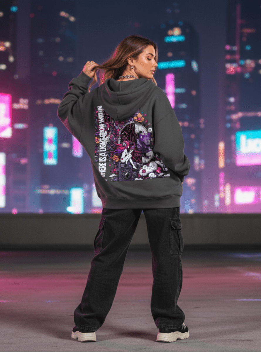 Person wearing a hoodie with a cityscape background